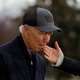 Illustration for article titled Viral Photo of Joe Biden Biting a Womans Finger Slightly Less Weird in Context